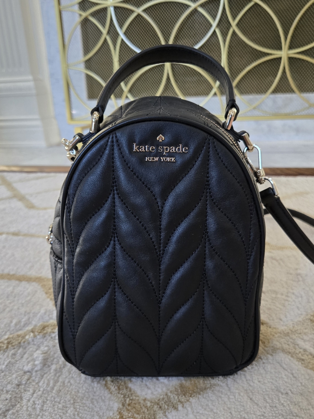 kate spade New York Quilted Black Mini Backpack
